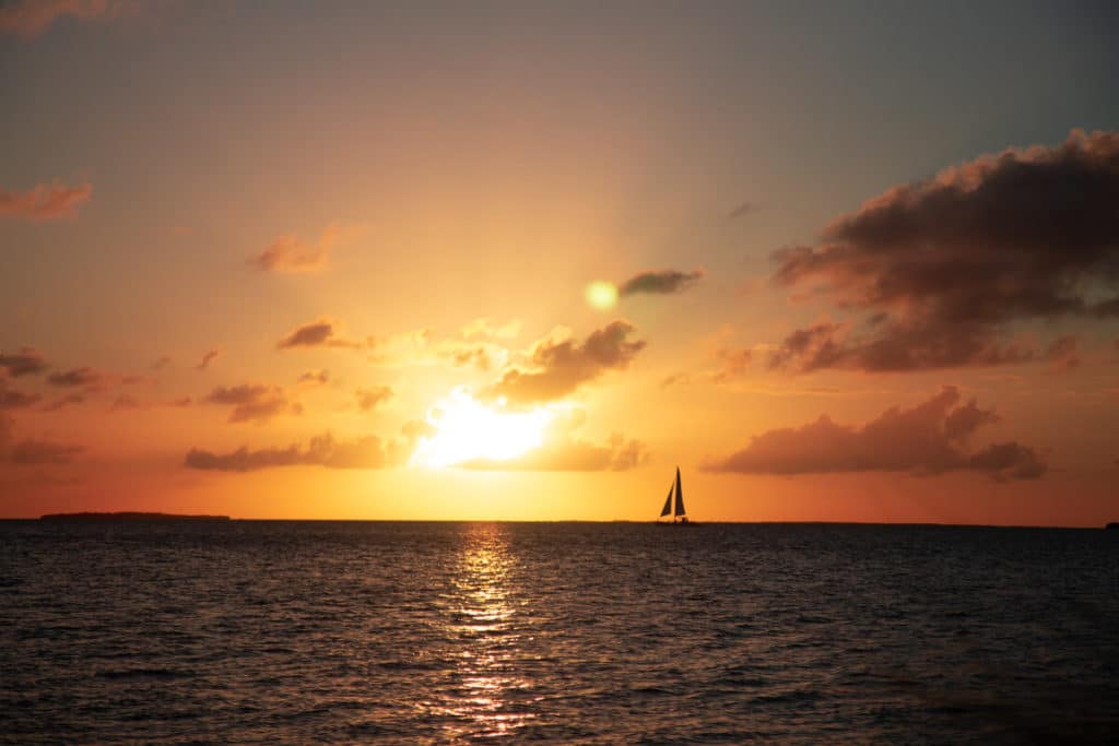 sailboat in front of Key West sunset