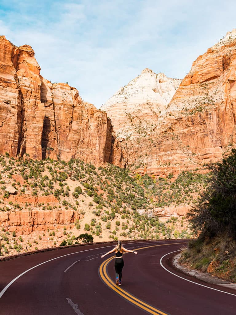 girl in road at Zion National Park