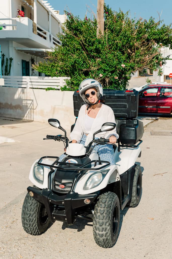 girl driving ATV in Greece