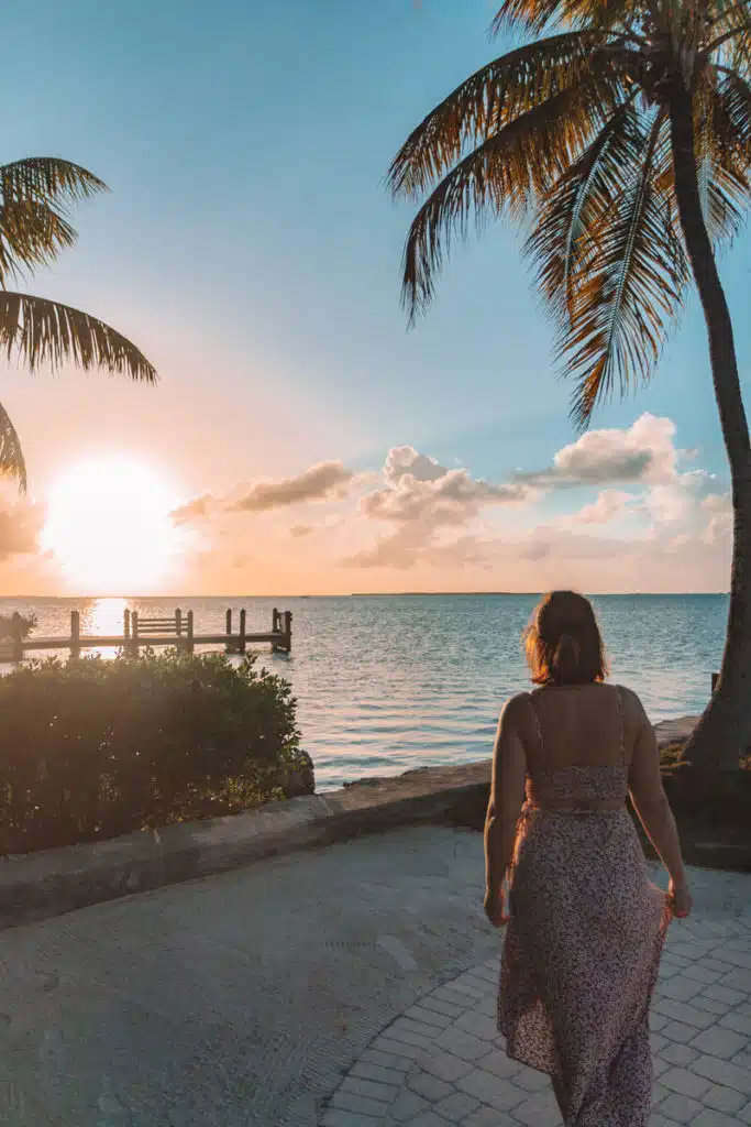 girl standing in front of ocean