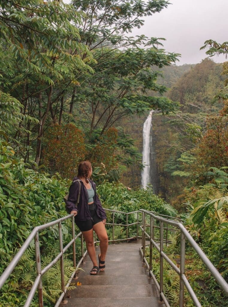 girl standing in front of Akaka Falls