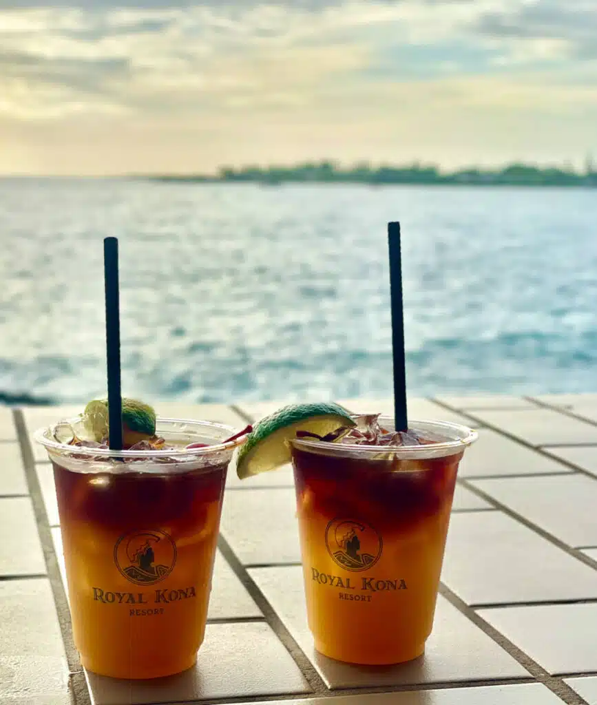 Mai tais in front of ocean in Hawaii