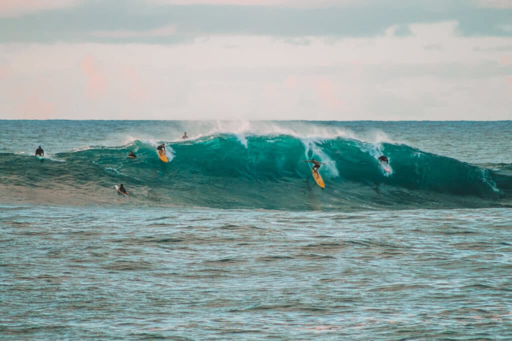 surfers on Hawaii's North Shore, Oahu