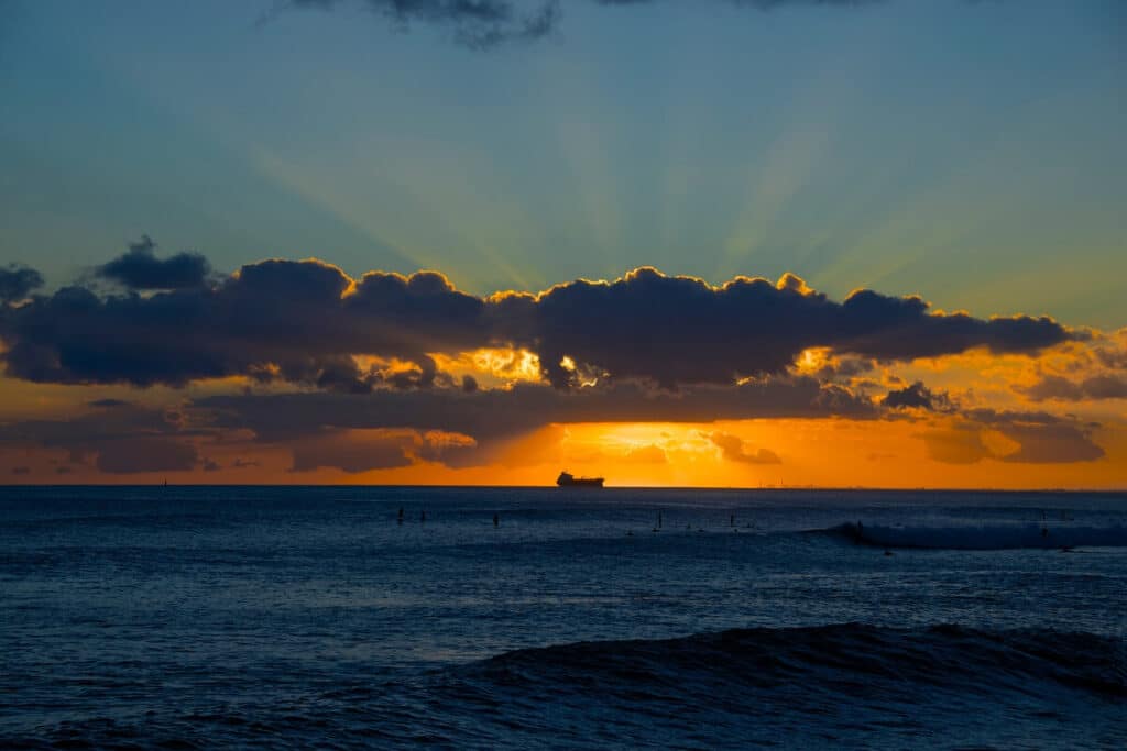 Waikiki sunset behind clouds