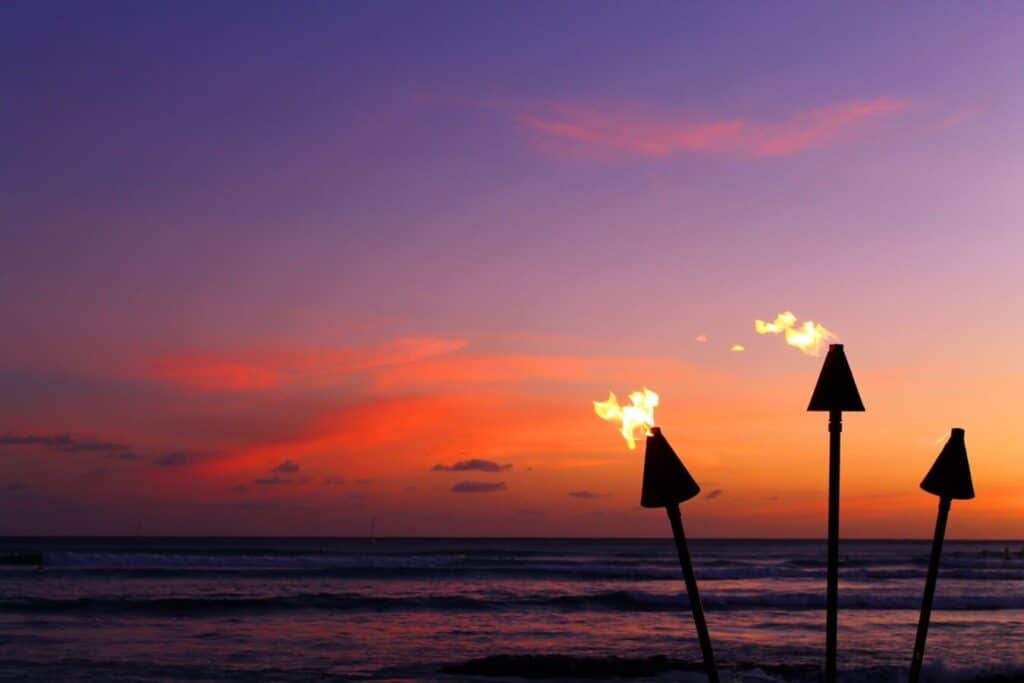 Tiki torches Big Island Hawaii sunset