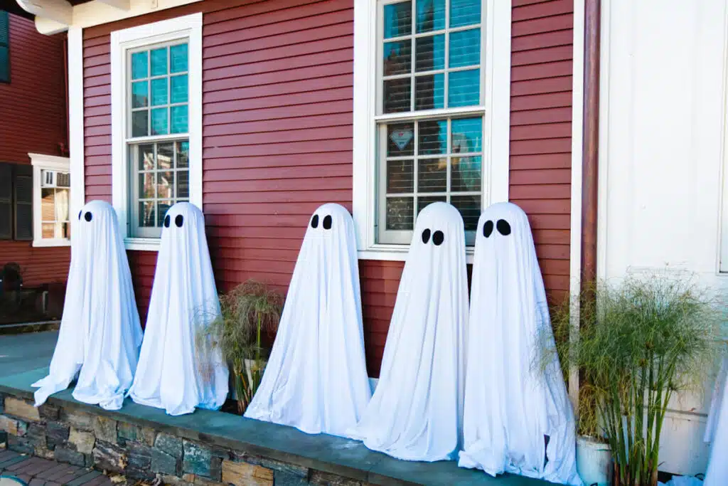 ghosts outside of red house in Stowe, Vermont
