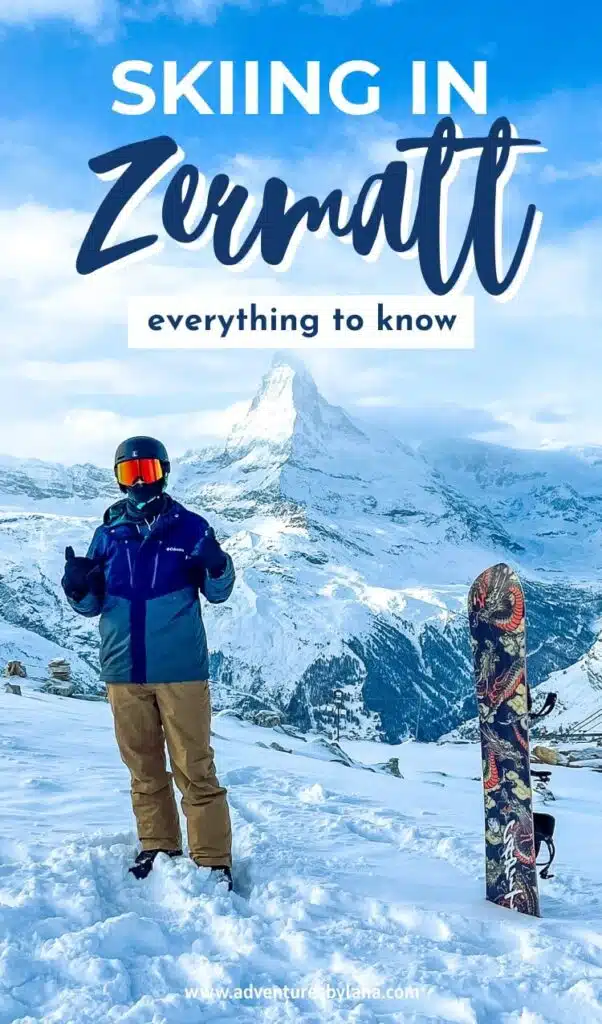 Person in ski gear standing in front of a snowboard with the snowy Matterhorn peak in the background, under text that reads “Skiing in Zermatt – everything to know”. Clear blue sky and alpine landscape emphasize the scenic Swiss location.